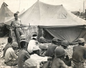 Bill Jr. with the 49 Koreans that he rescued from Peleliu caves